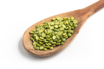 Dried Green Peas into a spoon