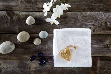 bodycare concept for symbol of zen toiletries on old wood