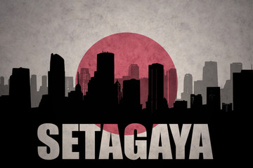 Fototapeta premium abstract silhouette of the city with text Setagaya at the vintage japanese flag background