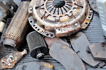 Old used dirty car parts.