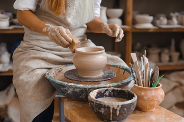 Potter teaches how make clay pot
