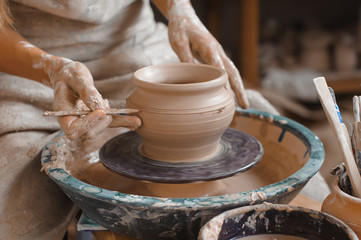 Potter teaches how make clay pot