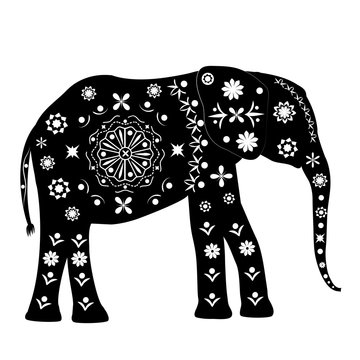 Silhouette of an elephant with patterns in ancient traditional s