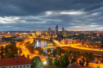 Aerial panoramic cityscape with skyscrapers of New Center of Vilnius from Gediminas Tower in the cloudy evening, Lithuania, Baltic states.
