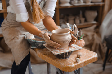 Potter teaches how make clay pot