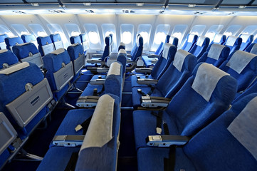Blue airplane empty seats