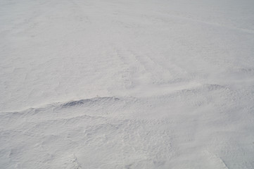 Background from firm snow in steppe.18