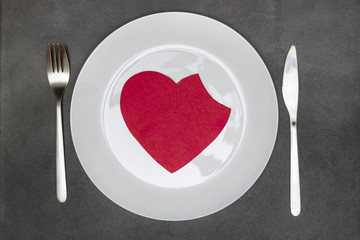 bitten heart on a plate
