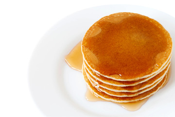Pancakes with maple syrup isolated on a white background. Breakfast, Dessert.