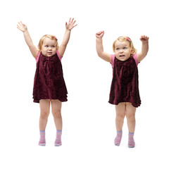 Young little girl standing over isolated white background