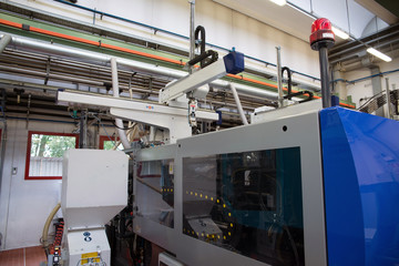 Injection molding machines in a large factory