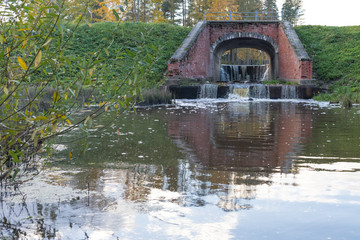 dam on the lake system in the old park