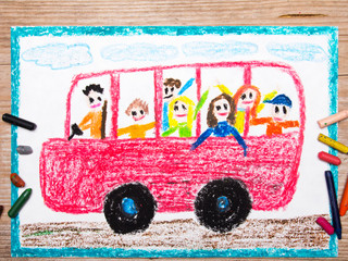Colorful drawing - red school bus with happy children inside