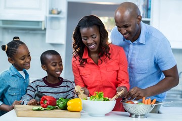 Happy family preparing food