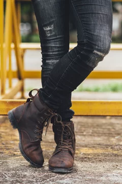 Men fashion, man's legs in black jeans and brown leather boots. Toned  picture. Stock Photo | Adobe Stock