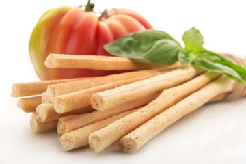 Crispy crunchy long bread sticks tied with rope