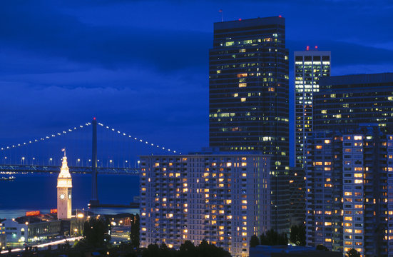 USA, San Francisco, Oakland Bay Bridge and skyline, with clock tower