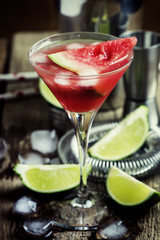 Alcoholic cocktail with watermelon, vodka, syrup, lime juice and