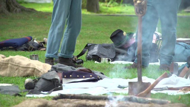 Civil War soldiers rest in camp