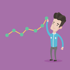 Businessman looking at chart going up.