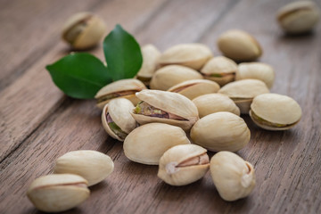 Pistachios on wooden table