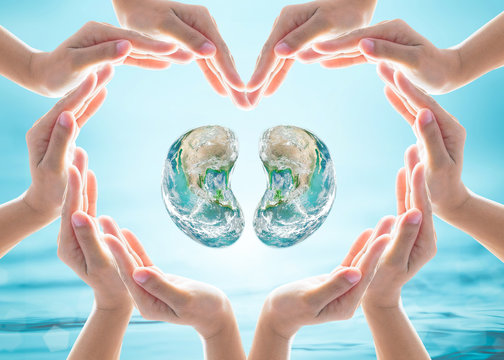 World Kidney Day design logo concept idea: Love heart shape symbolic sign of women human hands on blur blue turquoise clean aqua water background: Element of this image furnished by NASA