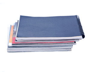 Pile of magazines separated on white background