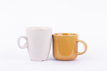 Coffee cup and milk cup on break time  on white background drink mug isolated

