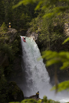 A kayaker running the 60 foot Sutherland Falls, Revelstoke, British Columbia, Canada.