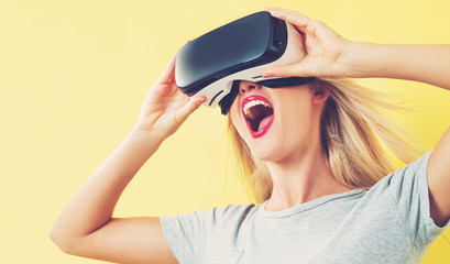 Young woman using a virtual reality headset