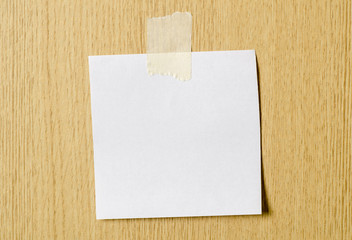 Blank paper card stick on wall