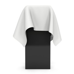 Presentation pedestal covered with white cloth