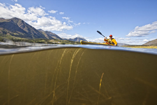 Kayaking on Annie Lake, Yukon, Canada.
