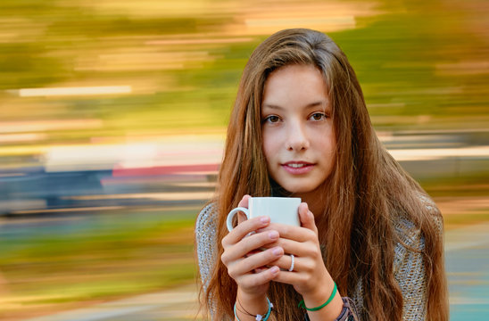 teenager girl with cup