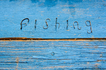 Fishing sign on the board top view