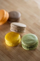 Colorful macaroon on wooden table