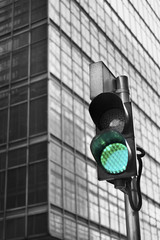 Traffic light with urban background