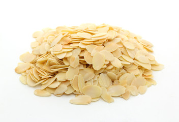 Pile of sliced almonds on white background
