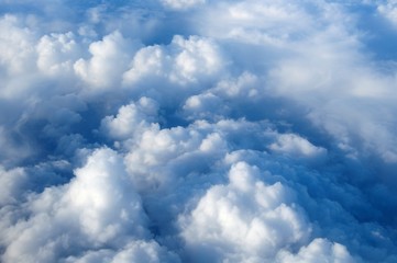 flight above clouds, ultraviolet sky, photo toned