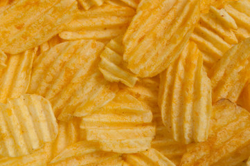 corrugated potato chips in the background