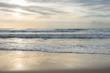 Fototapeta na wymiar beautiful summer sea, sunshine on sand beach background