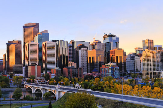 Bow River, Centre Street Bridge and skyline, Bow River, at dawn, Calgary, Alberta, Canada