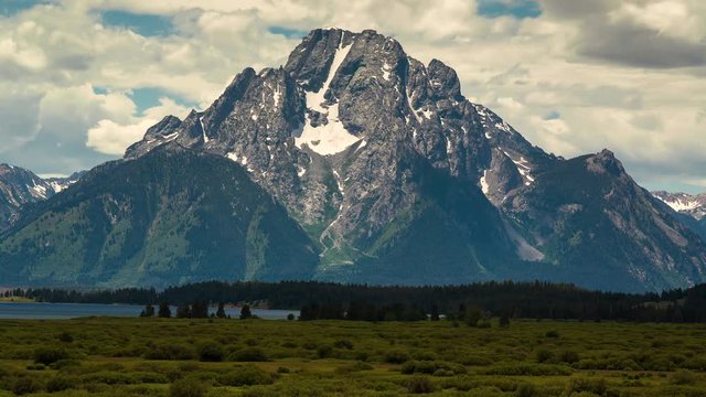 Time Lapse of a Lake with a view of the Grand Teton Mountains 