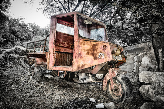 old cargo tricycle in the jungle countryside, Greece