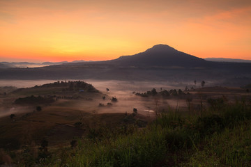 Misty morning sunrise in Khao Takhian Ngo View Point at Khao-kho