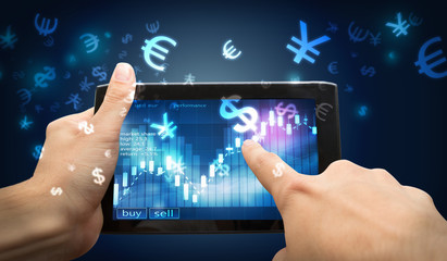 finger point on investment tablet