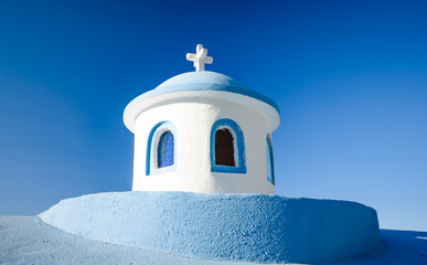 Typical blue tower of the small Greek church, the Greek island o