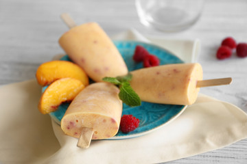 Tasty fruit ice-cream on plate, closeup
