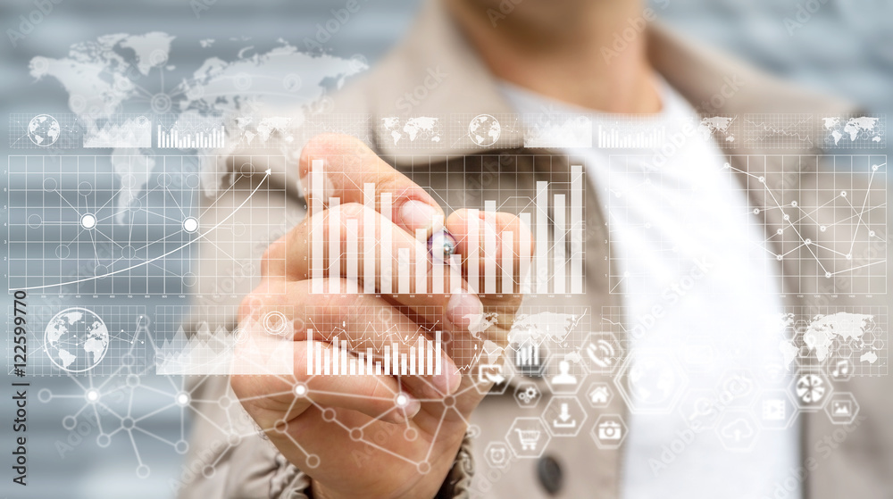Poster businessman using digital graph interface with a pen