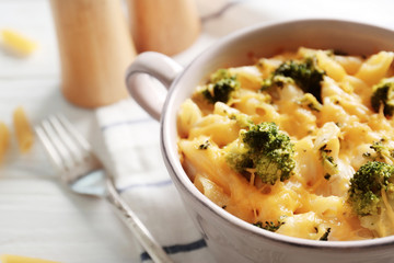 Delicious pasta Al Forno in ceramic bowl on napkin